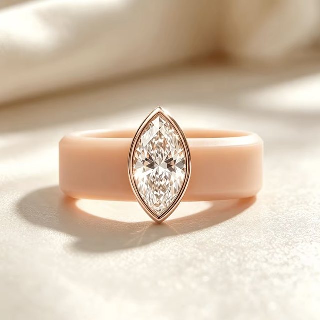 Gym Ring preview: a marquise-shaped stone in a rose gold bezel on a peach silicone band